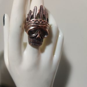 Skull with crown ring